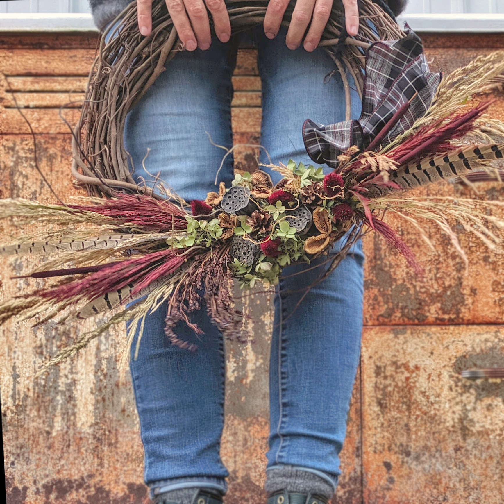 Botanical elements on a grapevine wreath