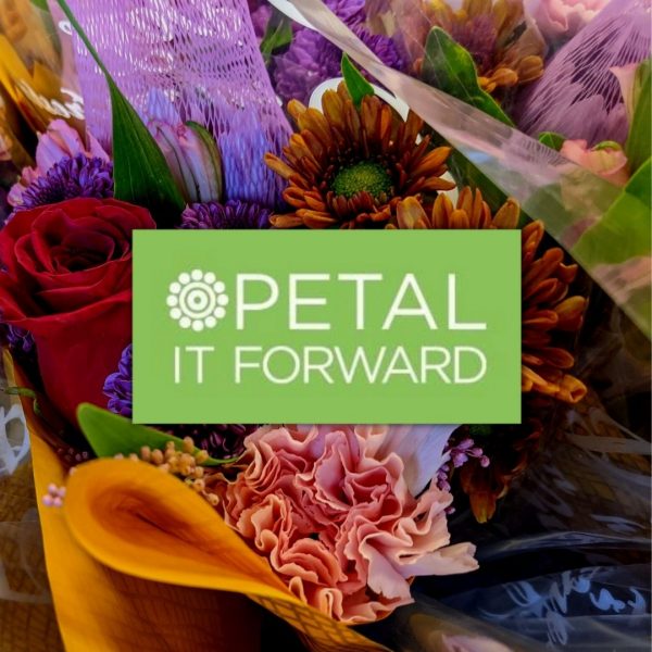 petal it forward logo with flower bouquet in the background