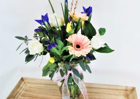 daisy and blue iris arrangement