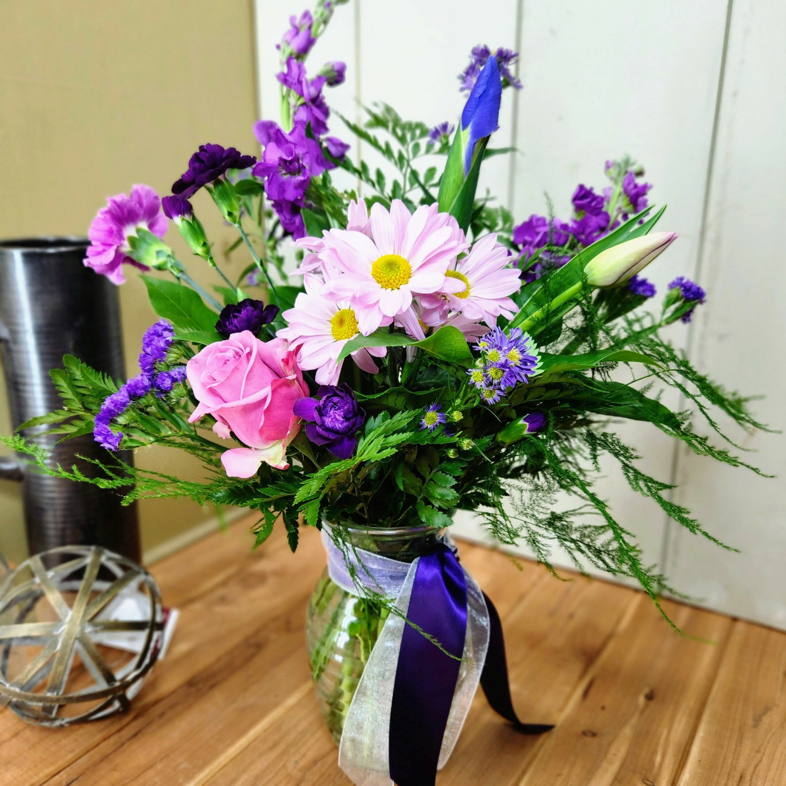 luscious lavender flower arranagement in vase.