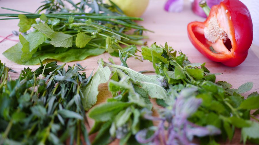 Table of herbs and pepper